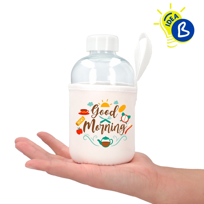 Ejemplo personalizado: Botella de cristal con funda personalizada · 600 ml. Diseño orientativo; personalización a tu gusto.
